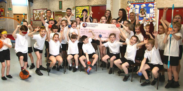 GB staff and St Paul's pupils with the Sport Relief cheque