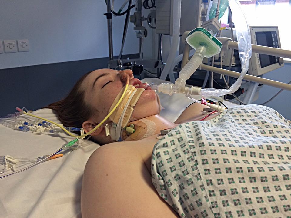 Julia in hospital bed